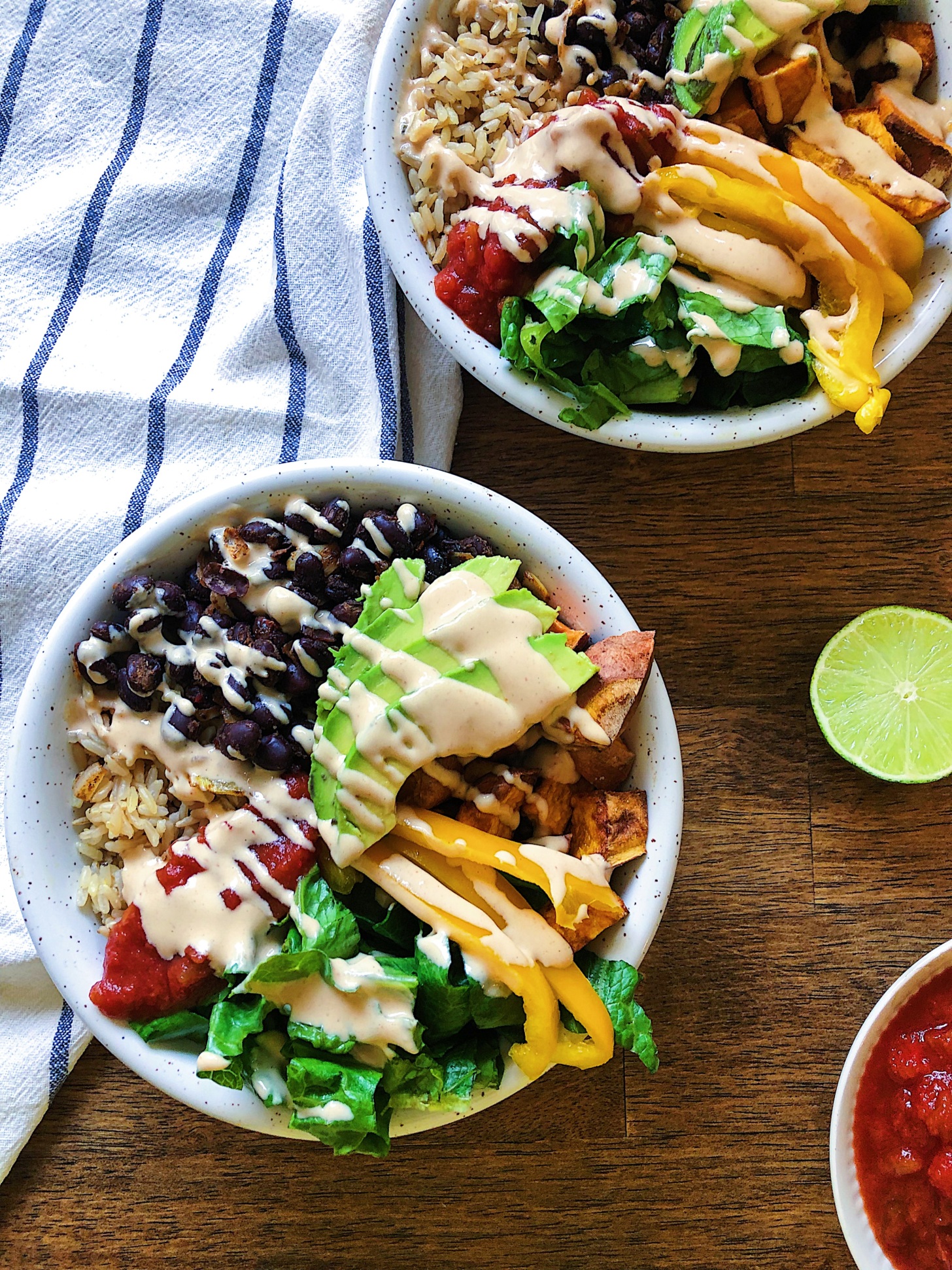 Vegan burrito bowl with spicy lime sauce