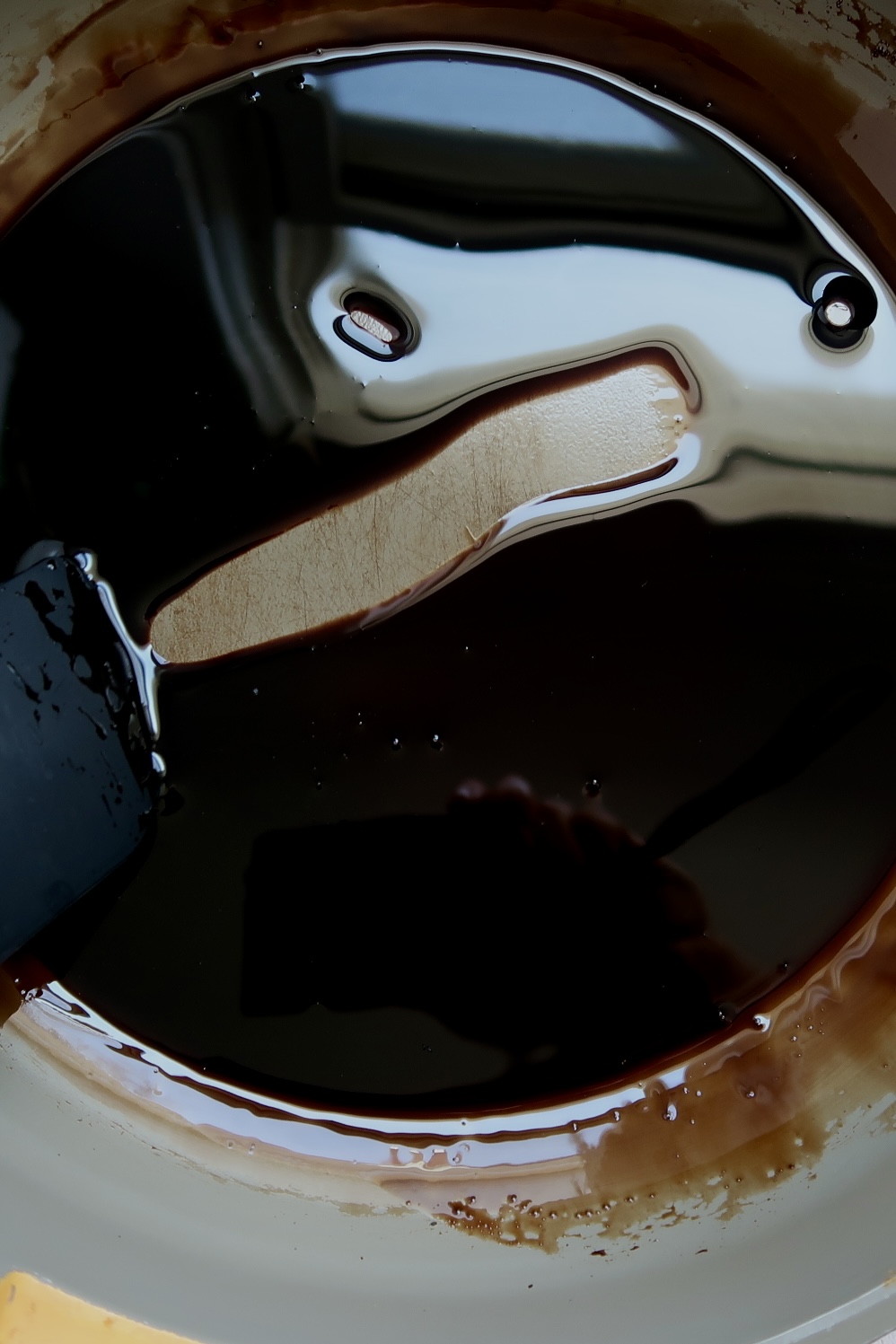 Balsamic glaze with a spatula through it