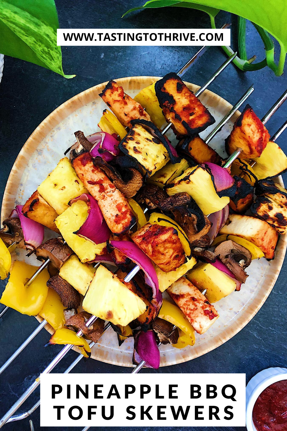 Pineapple BBQ Tofu Skewers recipe with a side of homemade BBQ sauce, vegan and gluten-free