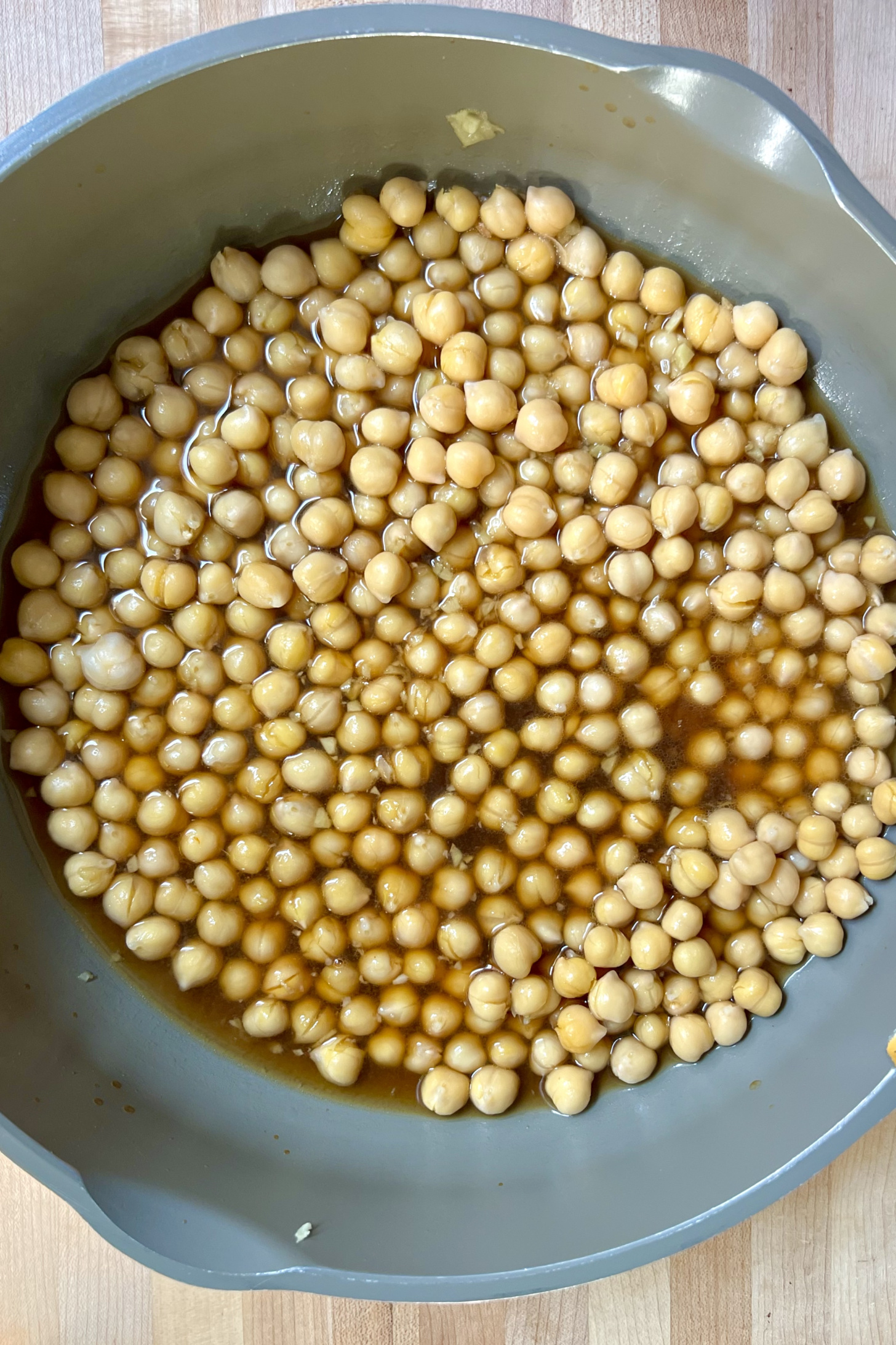 Pan with chickpeas and broth inside