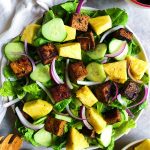 White plate with salad and Balsamic Glazed Tofu with pineapple