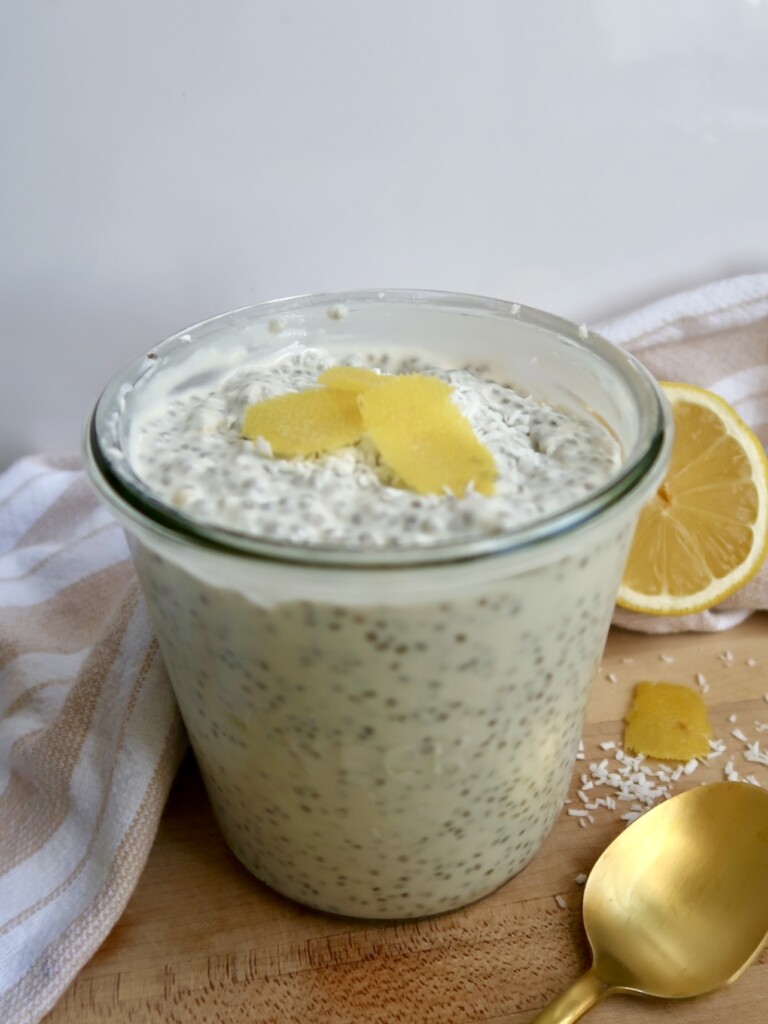 Jar with chia pudding and lemon zest on top.