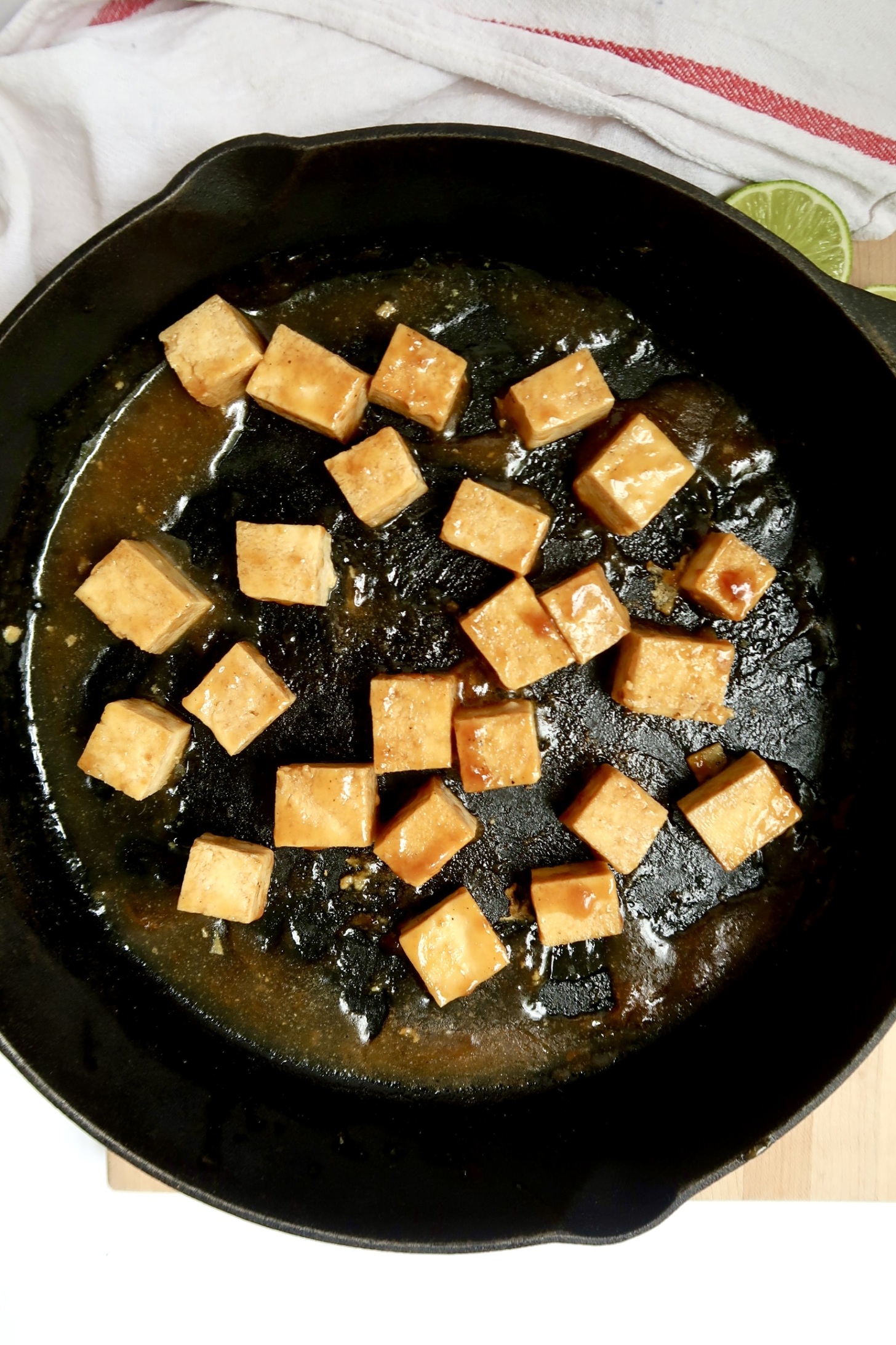 Pan with cubed tofu with teriyaki sauce.