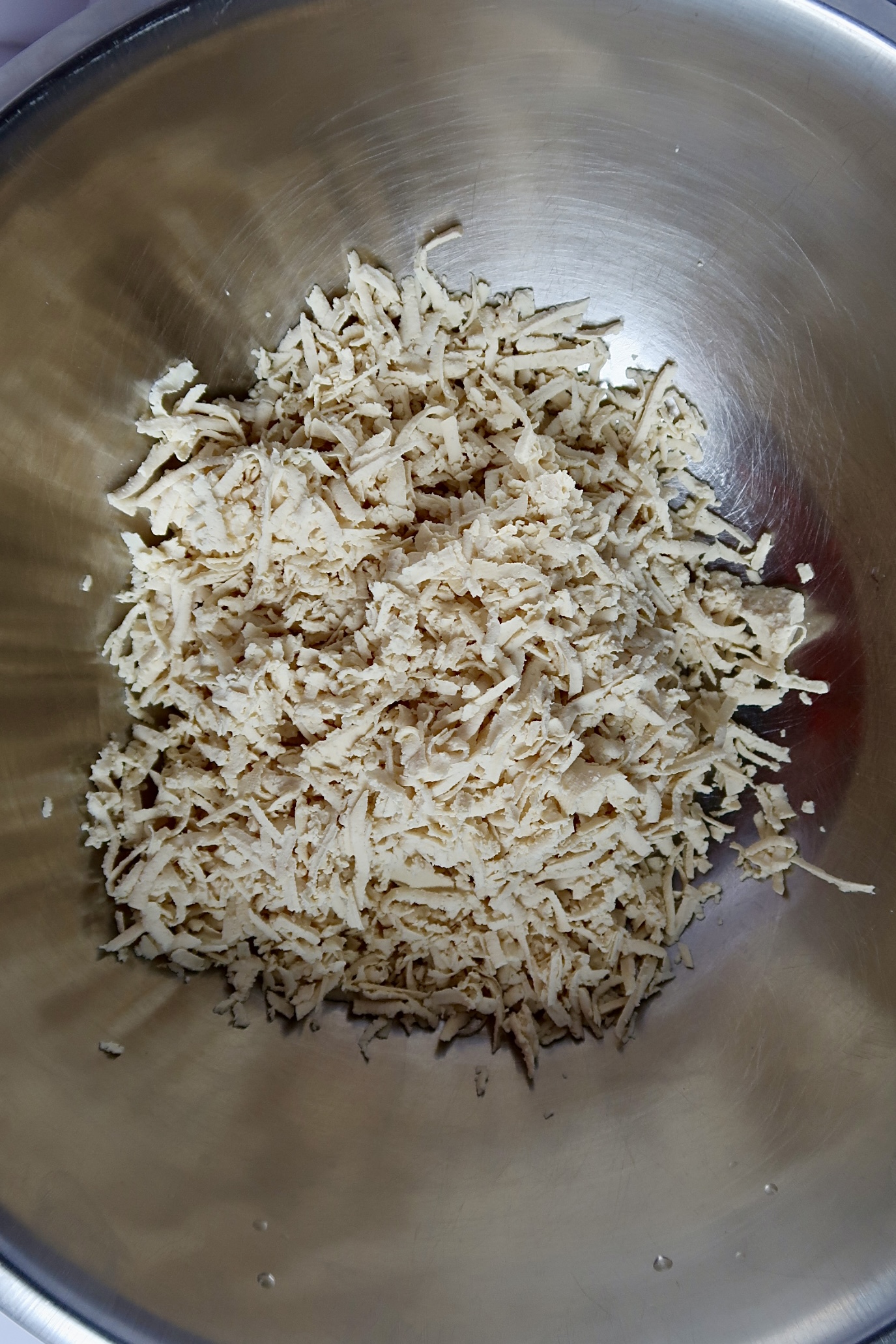Shredded tofu in a bowl