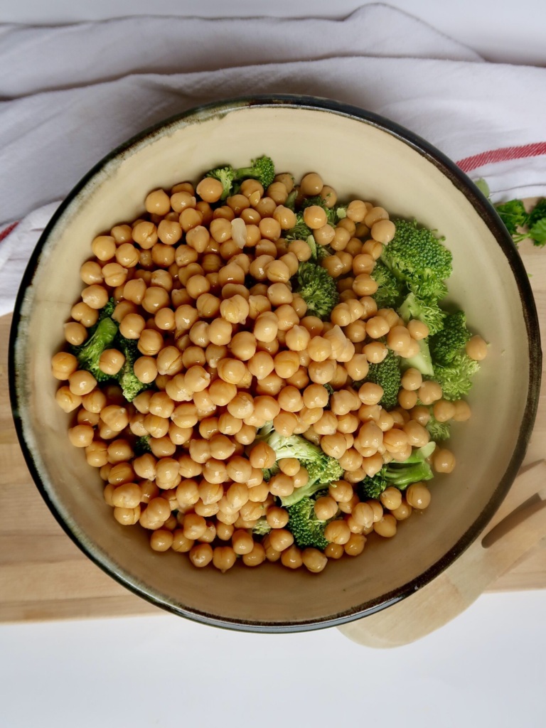 Bowl of broccoli florets and chickpeas.