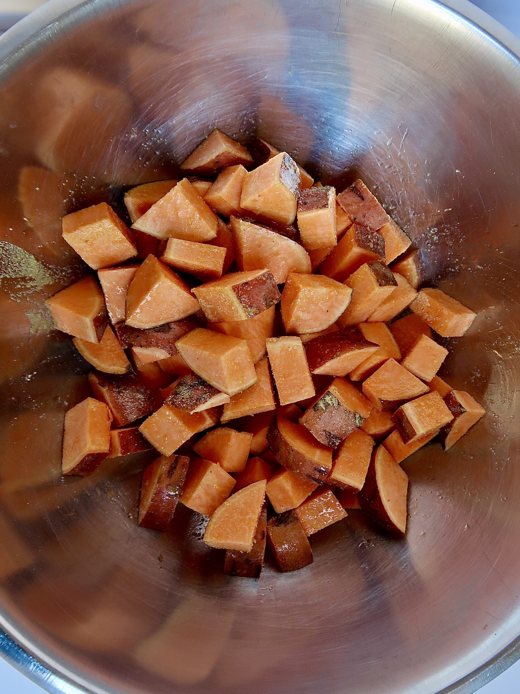 Bowl with diced sweet potato inside.