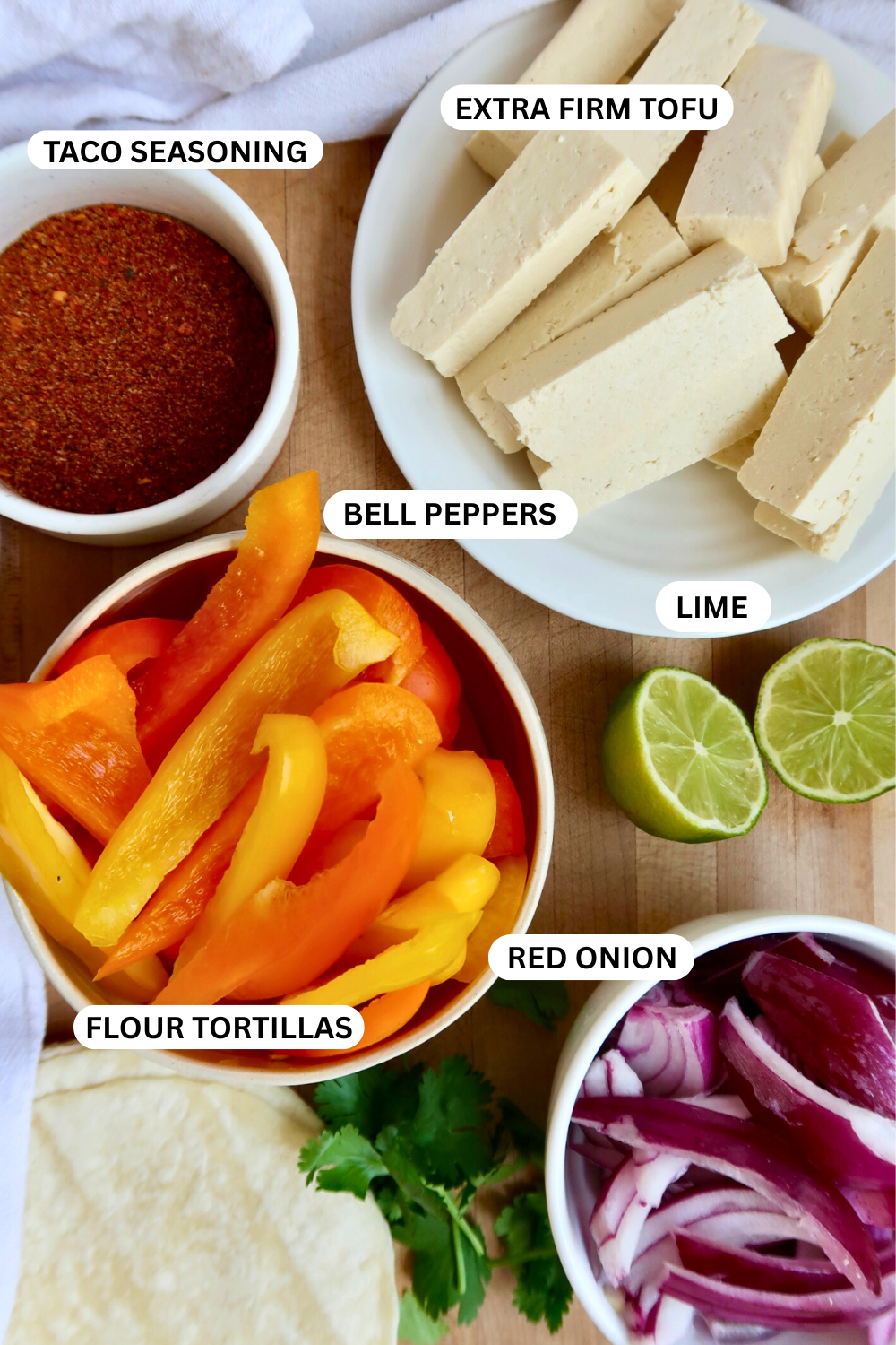 Flatlay of labeled ingredients for tofu fajitas.
