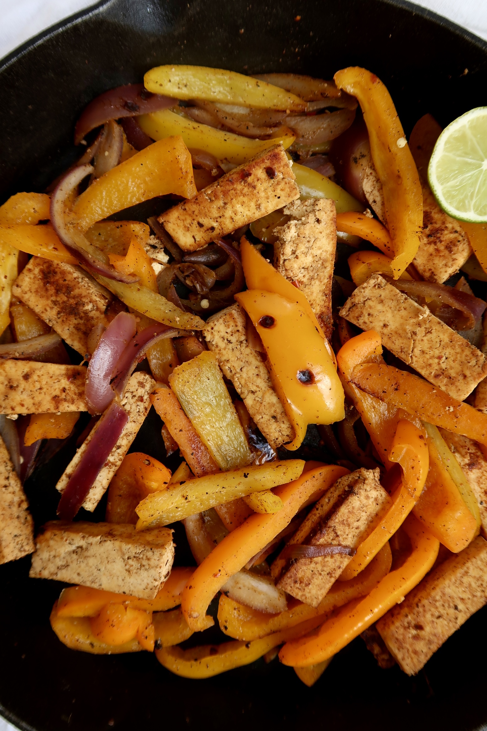 Pan of tofu fajita filling.