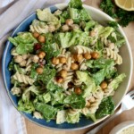 Bowl with romaine lettuce, pasta, crispy chickpeas.