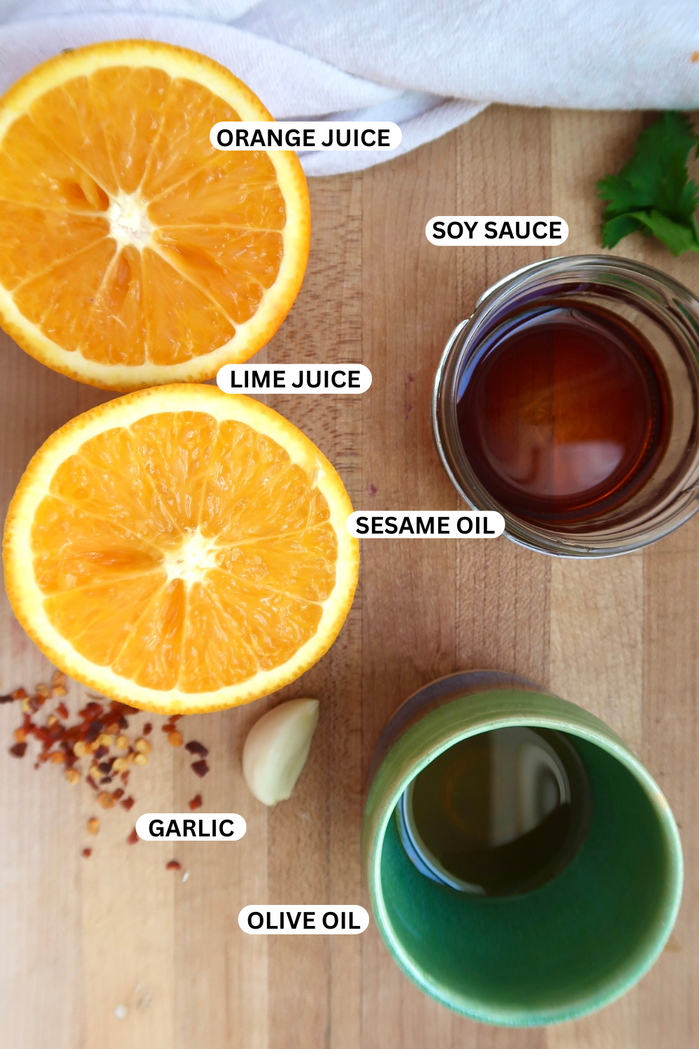 Ingredient flatlay of citrus sesame salad dressing.
