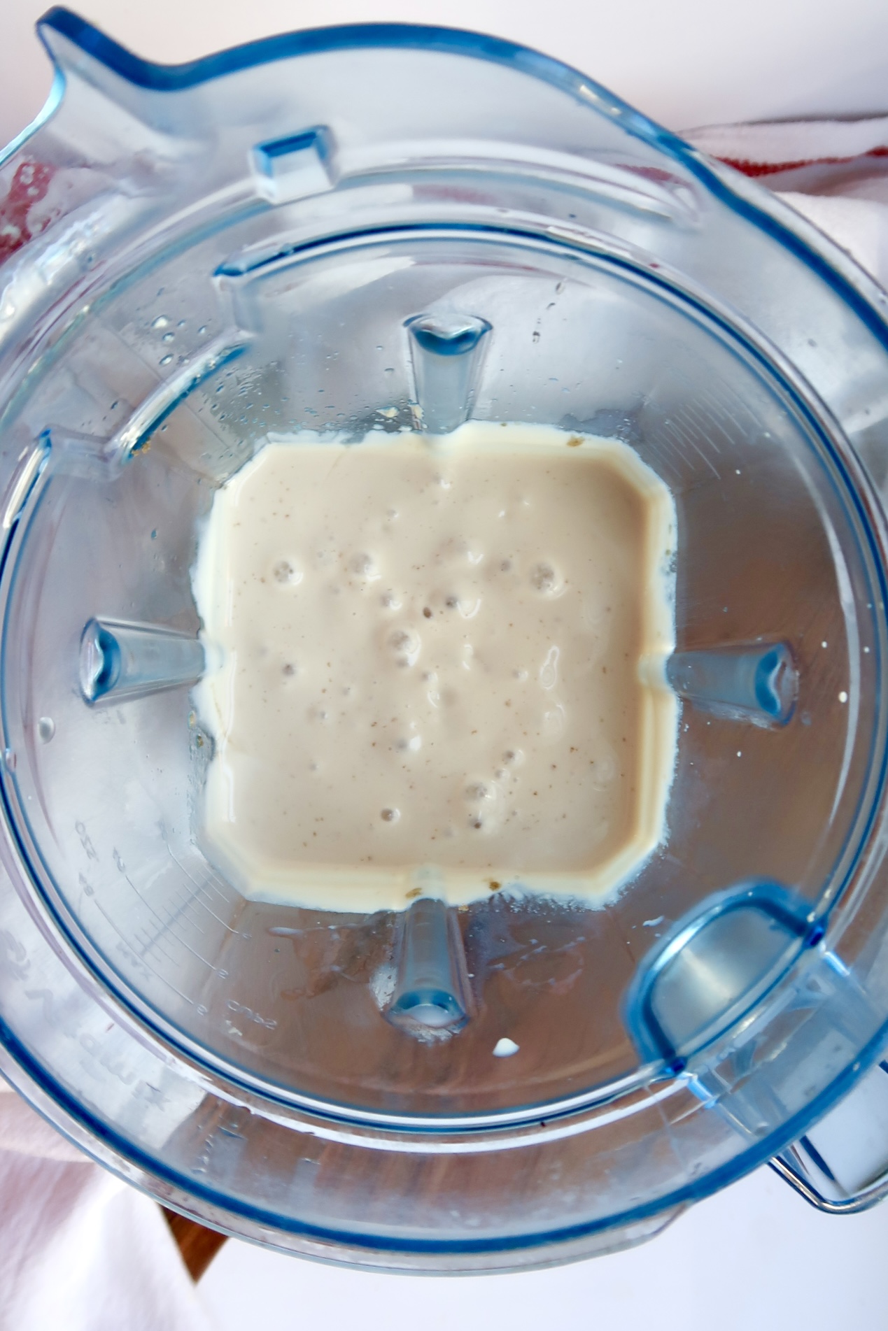 Blended coconut pudding mixture in a blender.